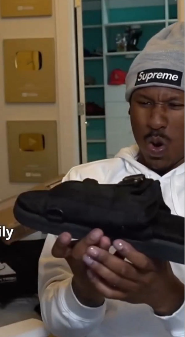 Duke Dennis holding DracoSlides, as featured by the brand